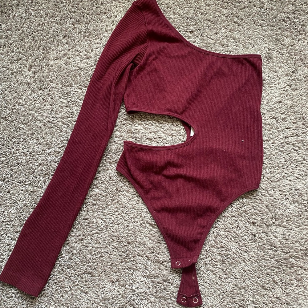 asymmetrical cut out bodysuit